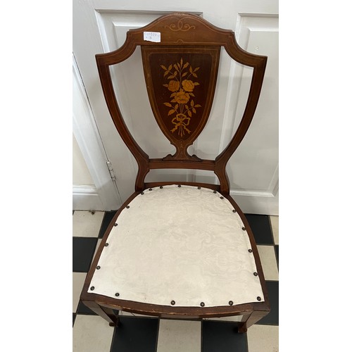 123 - A  mahogany and inlaid chair with floral decoration to back and square tapered legs to front.