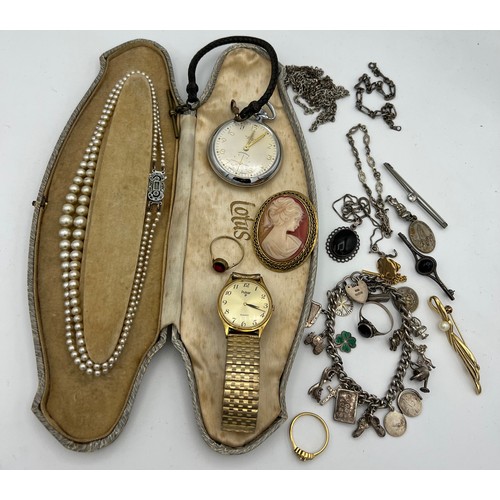 477 - A quantity of costume jewellery to include silver charm bracelet, brooches, pocket watch etc.