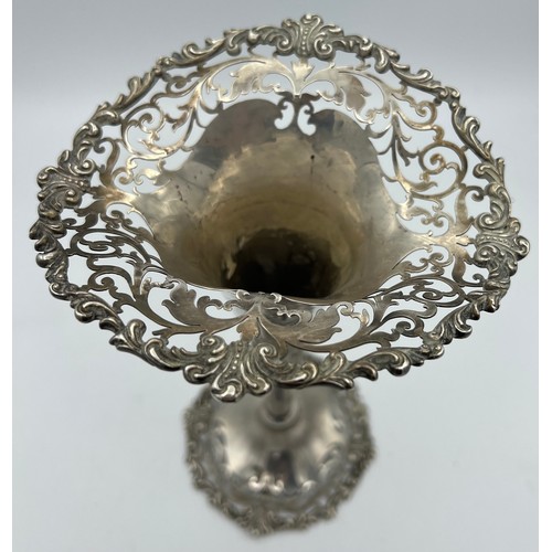 760 - Pierced silver vase London 1912. Weight 245gm. 22cm h.