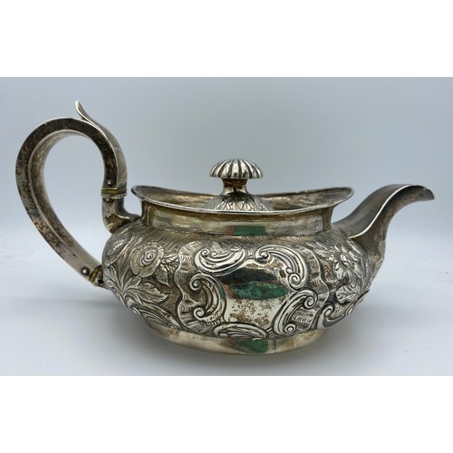 766 - A hallmarked silver teapot Dublin 1842 William Law, second makers mark indistinct. Engraved base 'Pr... 