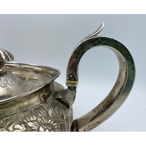 766 - A hallmarked silver teapot Dublin 1842 William Law, second makers mark indistinct. Engraved base 'Pr... 