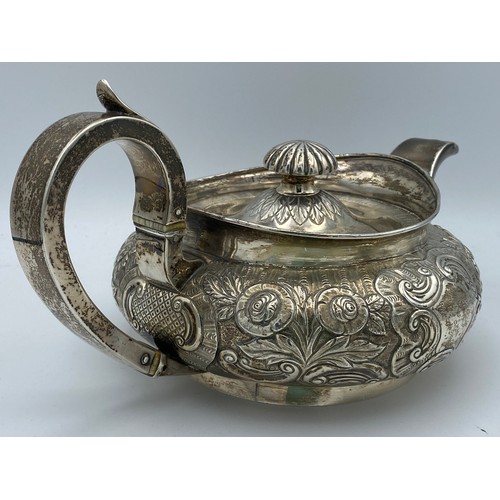 766 - A hallmarked silver teapot Dublin 1842 William Law, second makers mark indistinct. Engraved base 'Pr... 