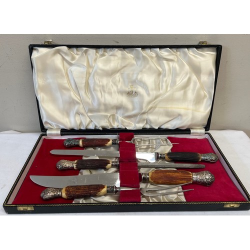 685 - A five piece antler handled Sheffield steel carving set by Samuel Peace in fitted box.