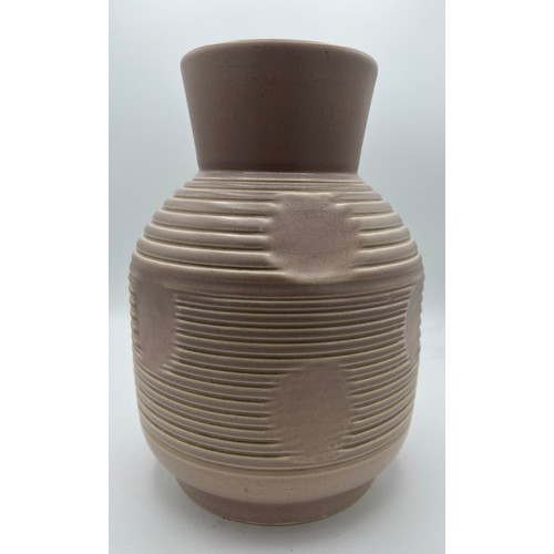 272 - Susie Cooper pale pink vase. 25cm h. Impressed signature and numbers to base.