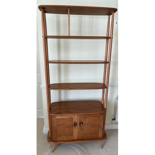 166 - An Ercol Giraffe room divider. 101cm h x81 w x 38 d.