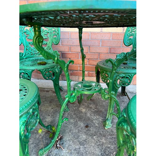 217 - Aluminium garden table and four chairs. 79cm d.