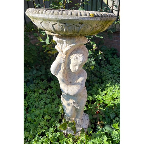 218 - Reconstituted stone cherub bird bath. 79cm h.