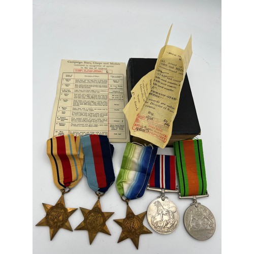 1206 - WWII service medals and Common prayer book including The Atlantic and Africa Star,