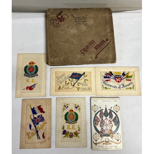 1222 - Cigarette album and contents together with five WWI silk postcards and a WWI postcard album.