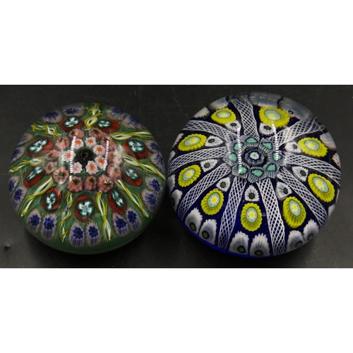 399 - A group of 13 paperweights, various colours and designs to include a Castleford dump and two millefi... 