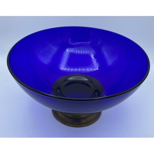 400 - A 20thC blue glass bowl on brass pedestal. 26cm d.