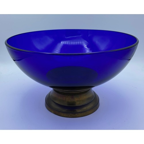 400 - A 20thC blue glass bowl on brass pedestal. 26cm d.