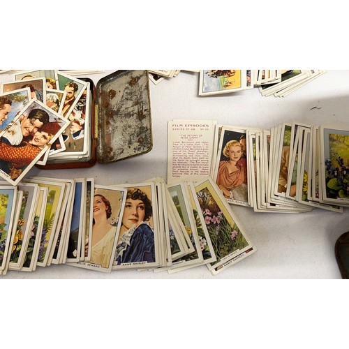 1223 - Cigarette cards to include Gallahers, Film Episodes, Famous Jockeys, Champions, Portraits of Famous ... 