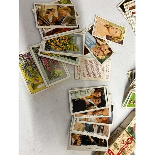 1223 - Cigarette cards to include Gallahers, Film Episodes, Famous Jockeys, Champions, Portraits of Famous ... 