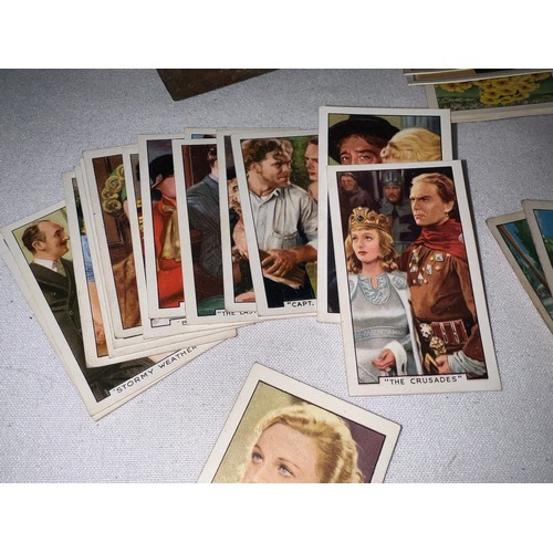 1223 - Cigarette cards to include Gallahers, Film Episodes, Famous Jockeys, Champions, Portraits of Famous ... 