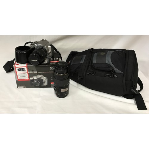 1166 - A Canon EOS 400D with EF 18-55 3.5-5.6 II lens with original box along with a Canon zoom lens EF 75-... 