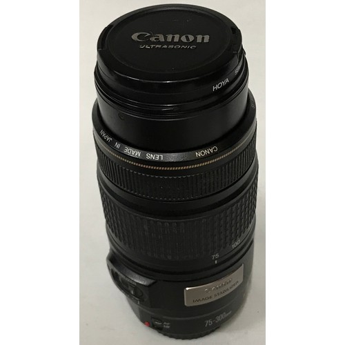 1166 - A Canon EOS 400D with EF 18-55 3.5-5.6 II lens with original box along with a Canon zoom lens EF 75-... 