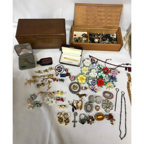 476 - A collection of costume jewellery to include majority pins, earrings, necklaces and brooches.