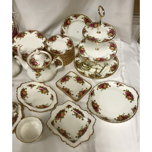 275 - A large collection of Royal Albert Bone China Old Country Rose Part Tea and Dinner Service to includ... 