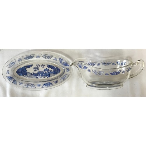 397 - A Pyrex tableware set decorated in Willow Pattern to include 6x large plates 23cm, 6x small plates 1... 