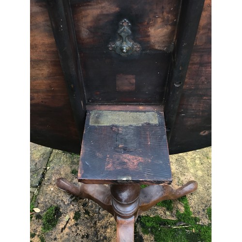 170 - A 19thC mahogany circular tip-top tripod table, 87 d x 71cm h.