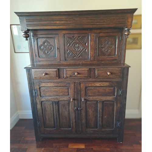 173 - A 19thC oak court cupboard. 168 h x 126 w x 55cm d.