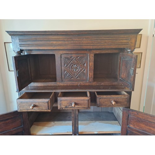 173 - A 19thC oak court cupboard. 168 h x 126 w x 55cm d.