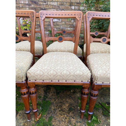 169 - A set of six Aesthetic Movement ebonised dining chairs. 87cm to back, 50cm to top of seat. Reupholst... 