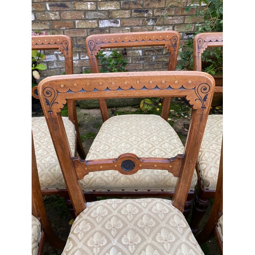 169 - A set of six Aesthetic Movement ebonised dining chairs. 87cm to back, 50cm to top of seat. Reupholst... 