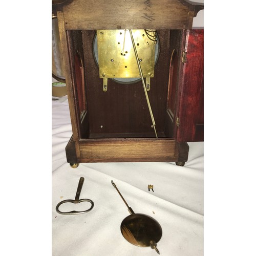 1176 - An inlaid mantle clock, the movement marked 16 and 1576 with engraved plaque to front 'Presented to ... 