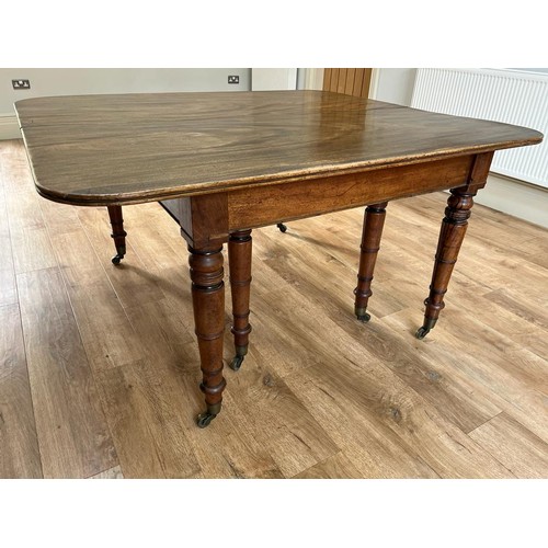 21 - A good quality 19thC mahogany dining table with 2 extra leaves. 147 w x 130cm d. Leaves 64cm so exte... 