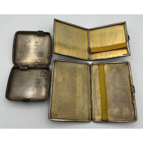 753 - Three silver cigarette cases with engine turned decoration. Total weight 447gm. Various dates
 and m... 