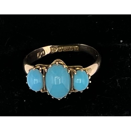 600 - A nine carat gold ring set with three turquoise stones. Size N. Weight 1.2gm.