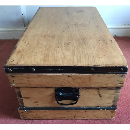 995 - A pine box with metal handles at either side and a metal lock to front. 97 w x 48 d x 31cm h.