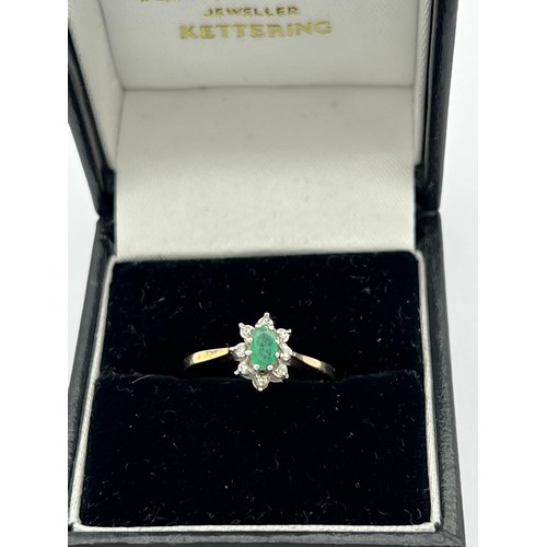 605 - Emerald and diamond ring set in 9 carat gold. Size M. Weight  1.5gm.