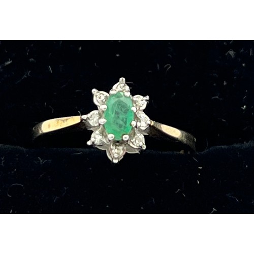 605 - Emerald and diamond ring set in 9 carat gold. Size M. Weight  1.5gm.