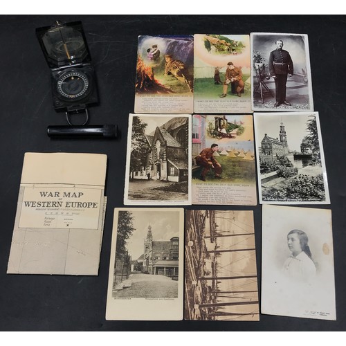 1251 - A miscellaneous lot to include a WWI newspaper war map of western Europe, 9x WWI period postcards, a... 