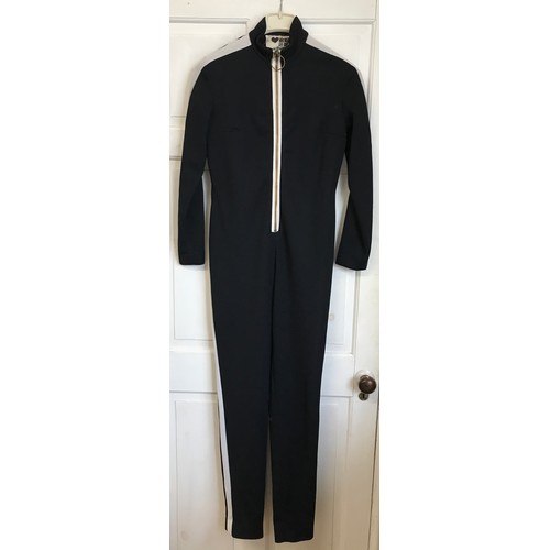 940 - A 1960's Kashmoor Avengers catsuit stitched with nylon thread and white stripes to side. approx. 150... 