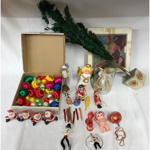 1257 - A selection of vintage Christmas decorations, toys and small tree. The tree dates from 1930s, the sq... 