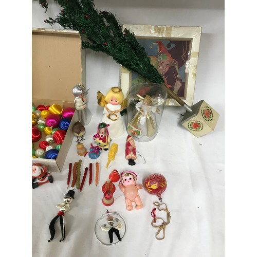 1257 - A selection of vintage Christmas decorations, toys and small tree. The tree dates from 1930s, the sq... 