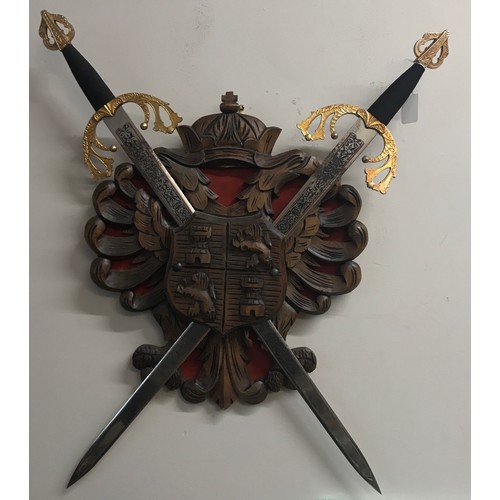 1258 - Spanish coat of arms 47cm x 40cm and two swords 82cm l from Toledo.