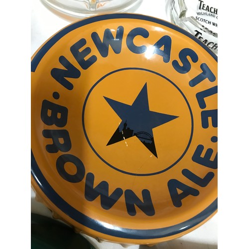 1248 - Brewery memorabilia to include ceramic and glass ashtrays and two metal trays together with various ... 