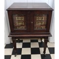 Oak army & navy C.S.L. campaign flatware chest of four inlaid drawers on removable legs with wheels.... 
