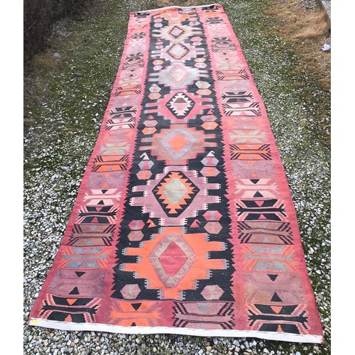 1208 - A large red, black and orange Kilim runner 420 l x 123cm w.