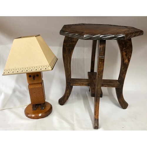 16 - A tall wooden four legged stool with carved top 45cm h along with an oak owl lamp and shade 42cm h.
