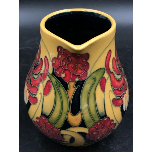 385 - A Moorcroft jug, dated 2008, tube lined with the Mustard Honeysuckle Haze pattern by Emma Bossons, f... 