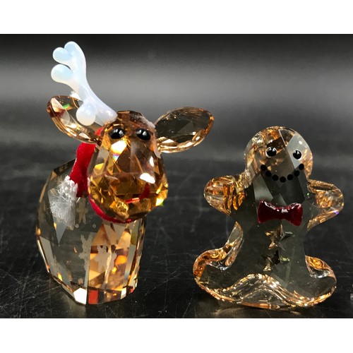 433 - Six Swarovski glass figures comprising of mainly a Christmas theme to include: Reindeer, gingerbread... 