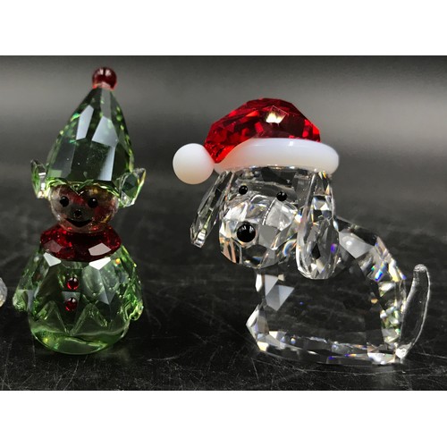 433 - Six Swarovski glass figures comprising of mainly a Christmas theme to include: Reindeer, gingerbread... 