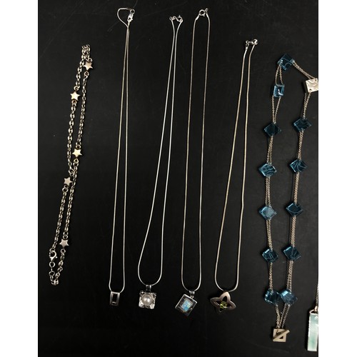 458 - A collection of 11 necklaces to include a string of multi-coloured pearls, 2 silver enamel chains, 2... 