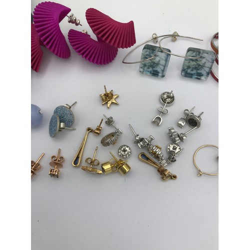 459 - A collection of Earrings and Rings to include some gold and silver.